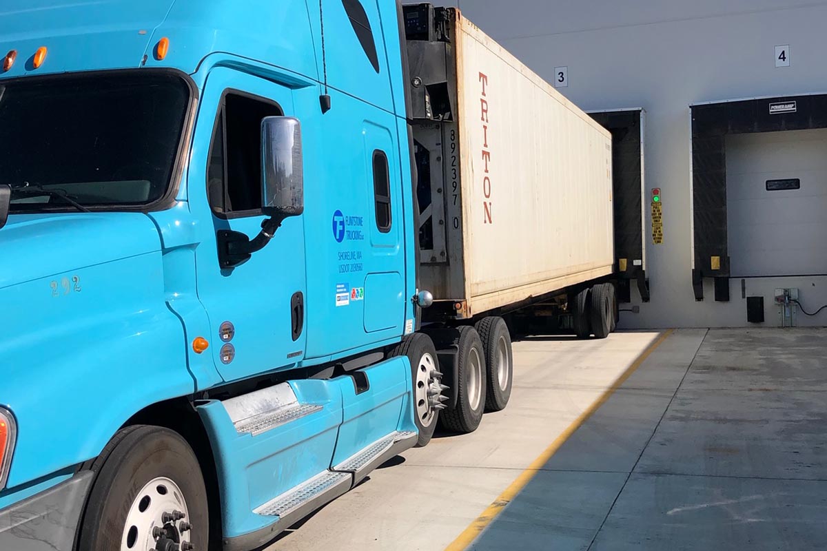 Flintstone Trucking truck at a Seattle-area loading dock